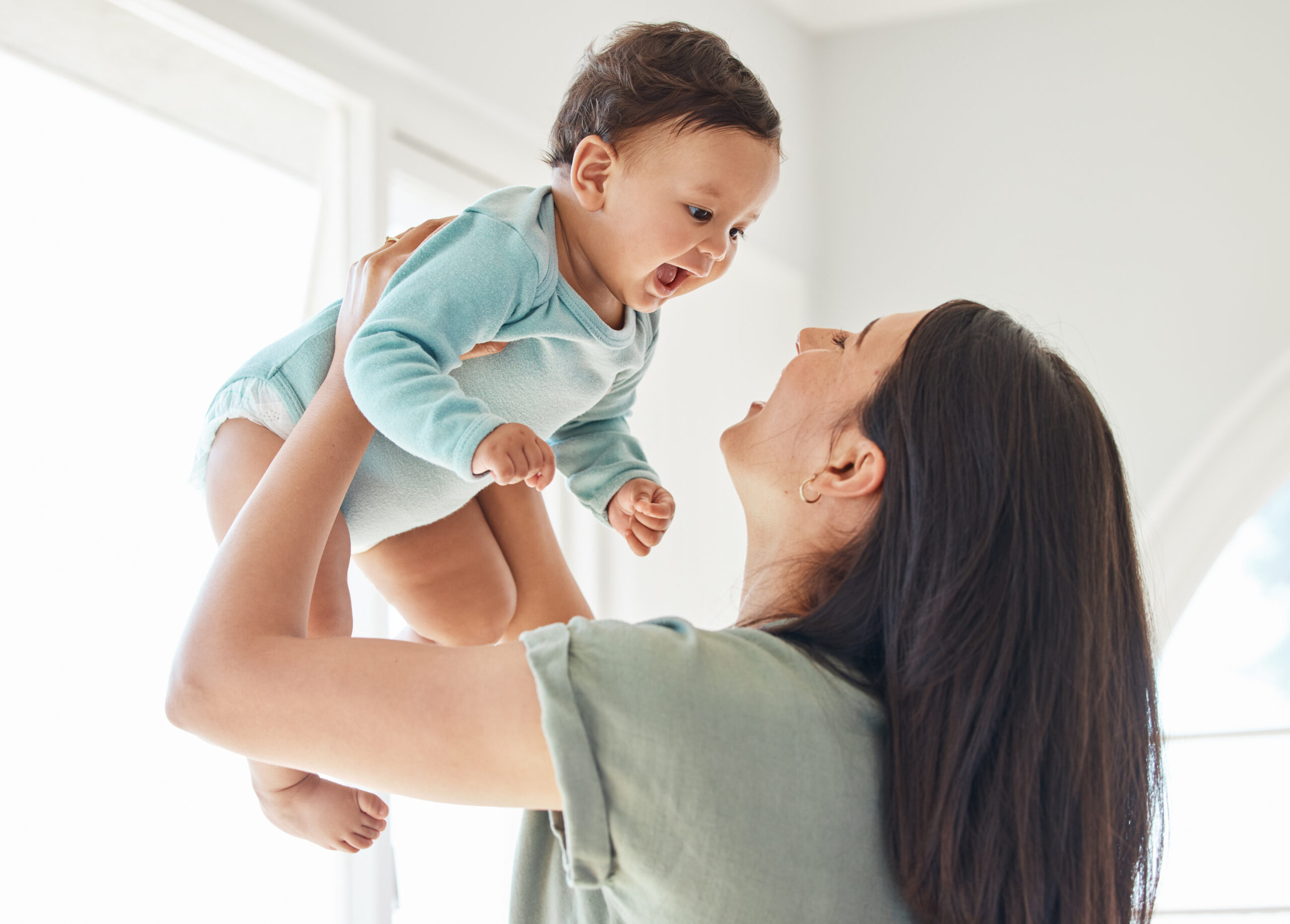 Happy child talking to doctor